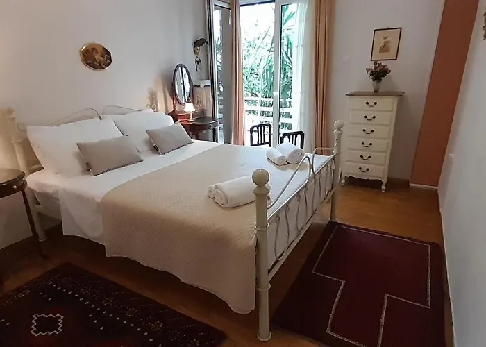 Apartment With A Green Balcony In Athens